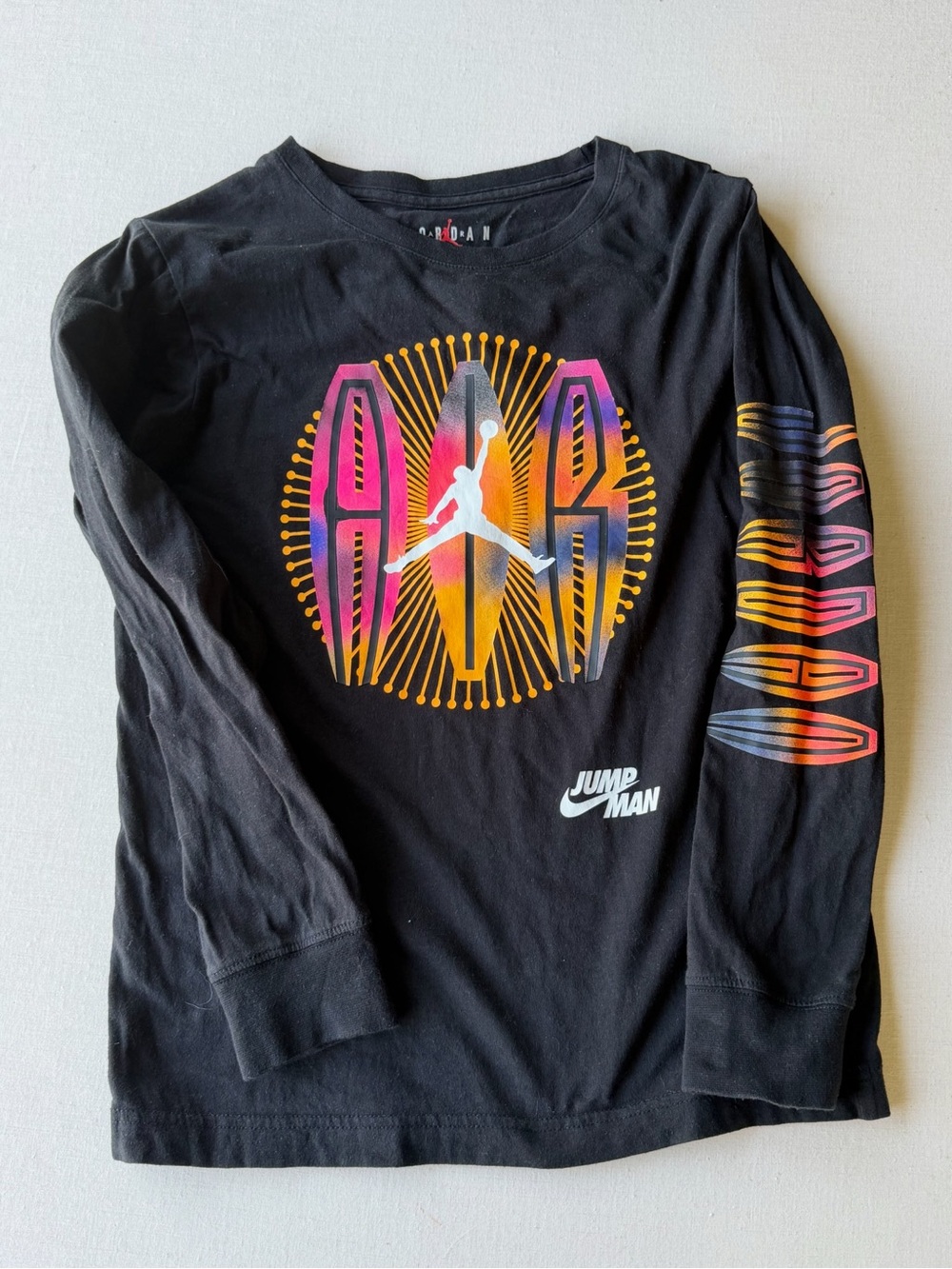 Jordan Jump Kids' Black Long-Sleeve Graphic Tee with Multicolor Logo